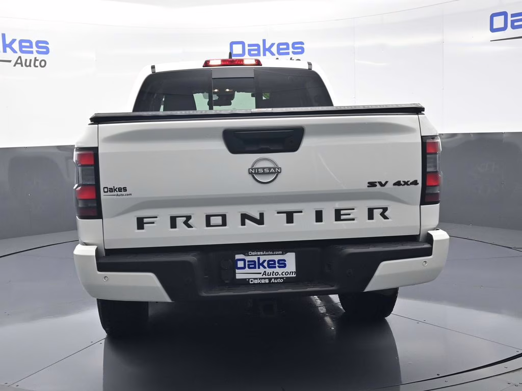 2023 Glacier White Nissan Frontier SV 4X4 Truck