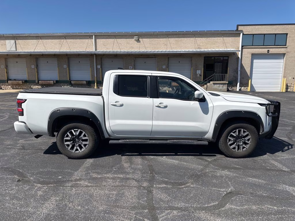 2023 Glacier White Nissan Frontier SV 4X4 Truck