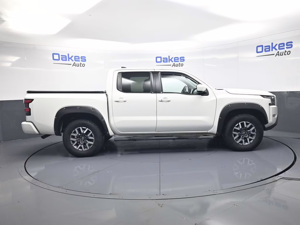 2023 Glacier White Nissan Frontier SV 4X4 Truck