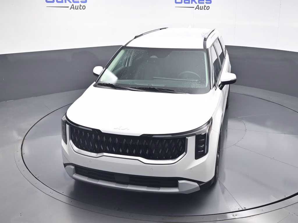 2026 Snow White Pearl Kia Carnival EX FWD Van