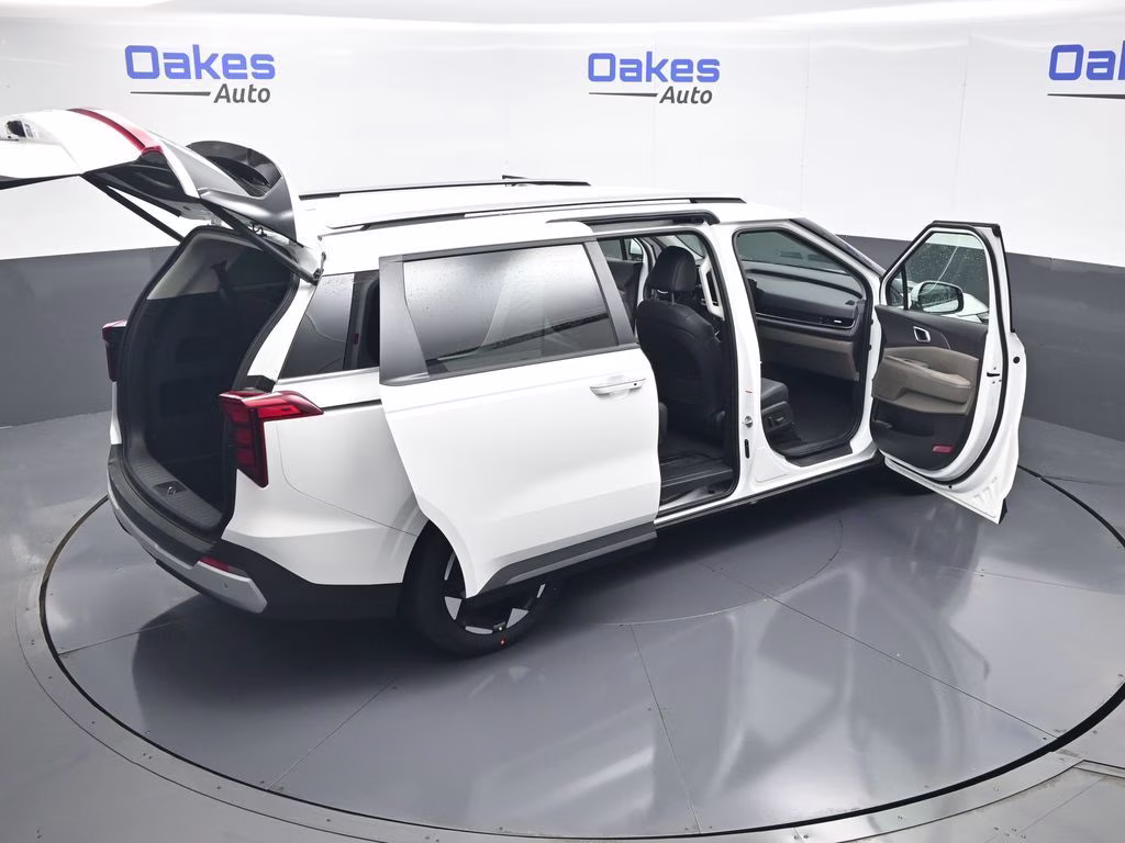 2026 Snow White Pearl Kia Carnival EX FWD Van