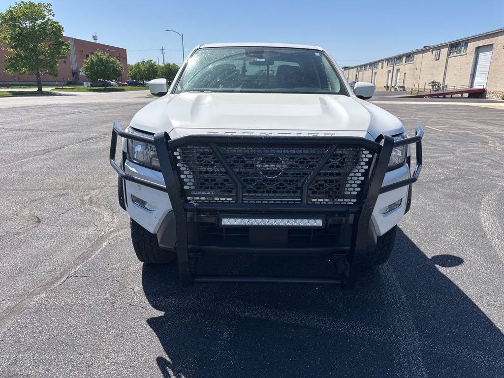 2023 Glacier White Nissan Frontier SV 4X4 Truck