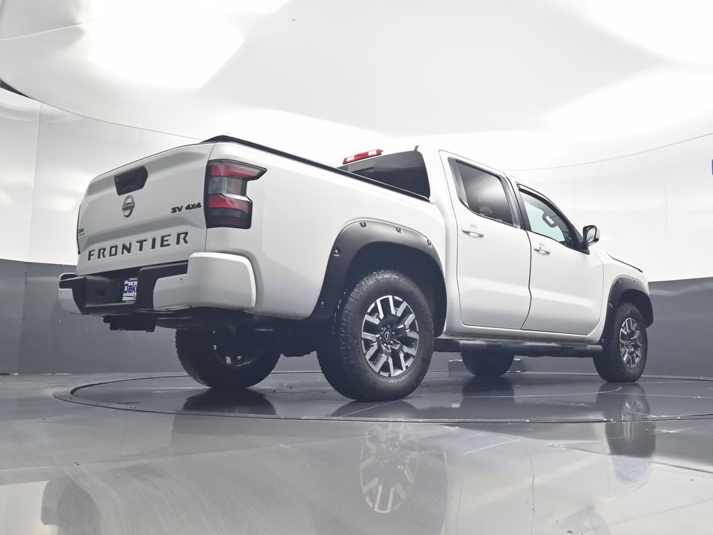 2023 Glacier White Nissan Frontier SV 4X4 Truck