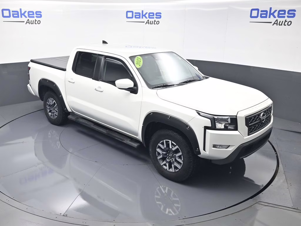 2023 Glacier White Nissan Frontier SV 4X4 Truck