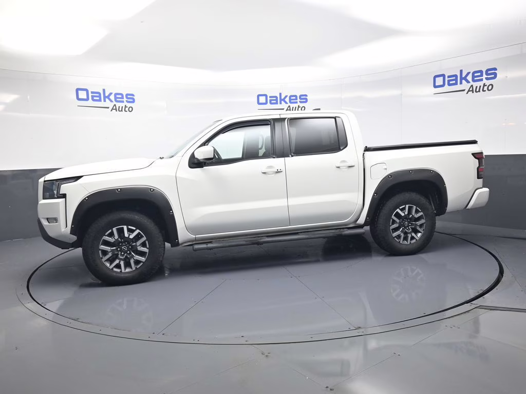 2023 Glacier White Nissan Frontier SV 4X4 Truck