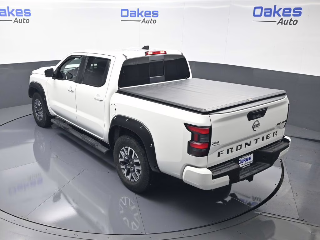 2023 Glacier White Nissan Frontier SV 4X4 Truck
