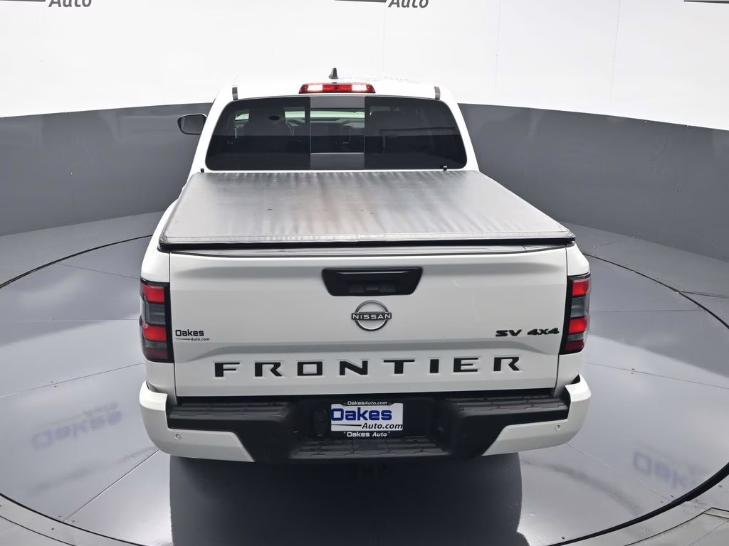 2023 Glacier White Nissan Frontier SV 4X4 Truck