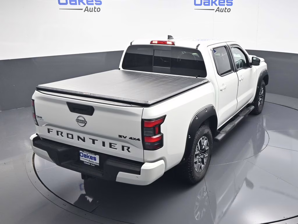 2023 Glacier White Nissan Frontier SV 4X4 Truck