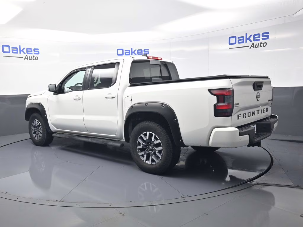2023 Glacier White Nissan Frontier SV 4X4 Truck