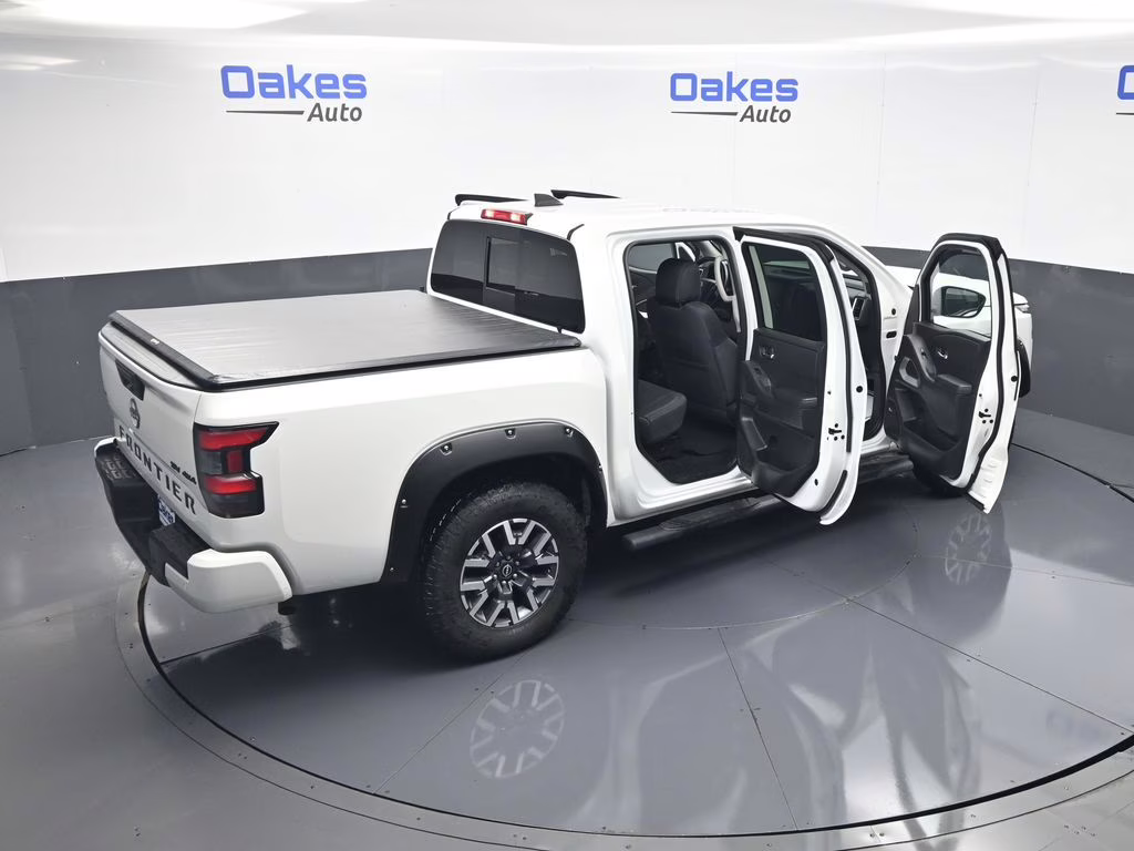 2023 Glacier White Nissan Frontier SV 4X4 Truck