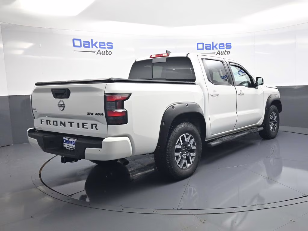 2023 Glacier White Nissan Frontier SV 4X4 Truck