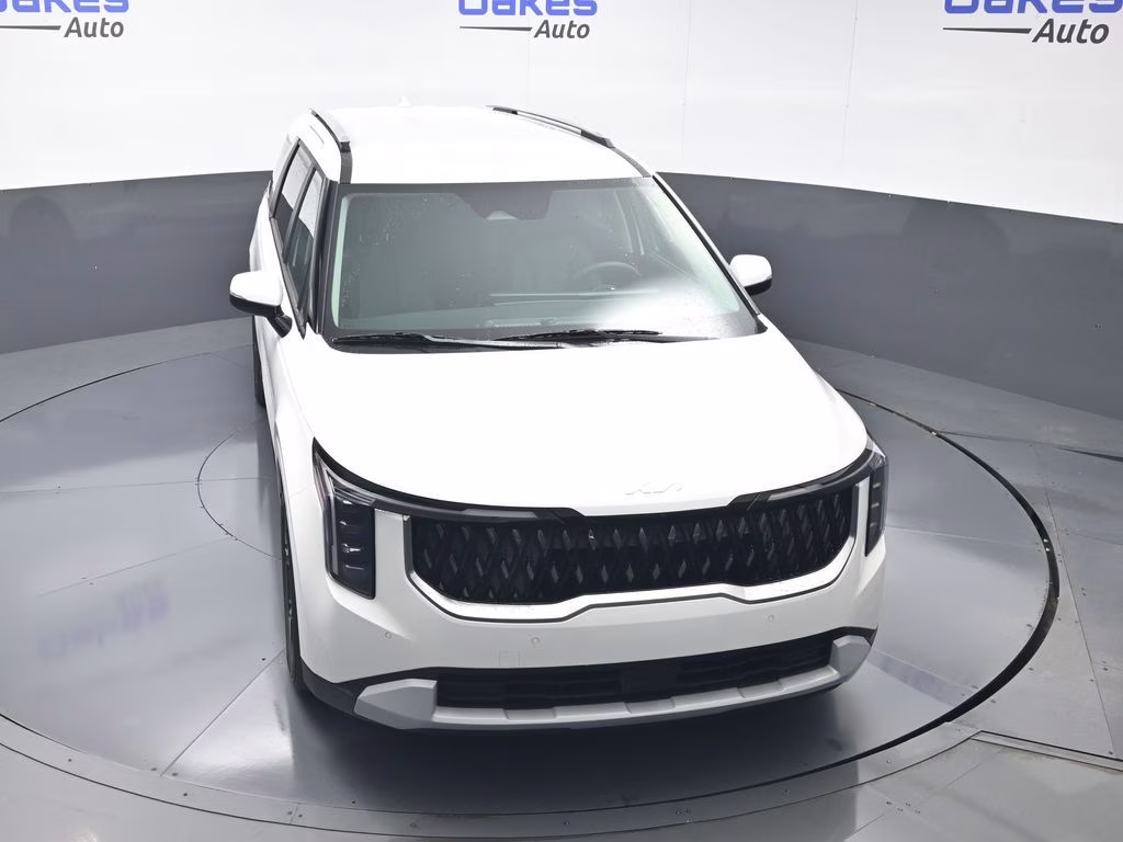 2026 Snow White Pearl Kia Carnival EX FWD Van