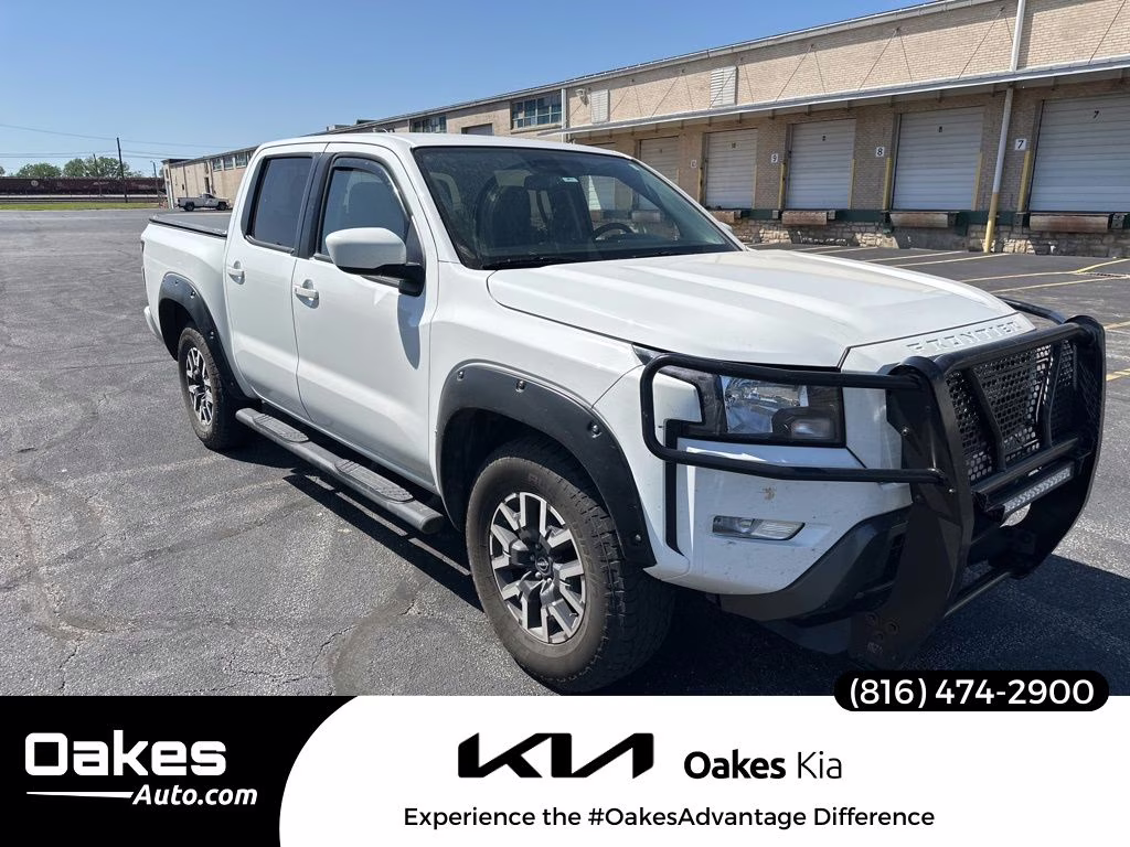 2023 Glacier White Nissan Frontier SV 4X4 Truck