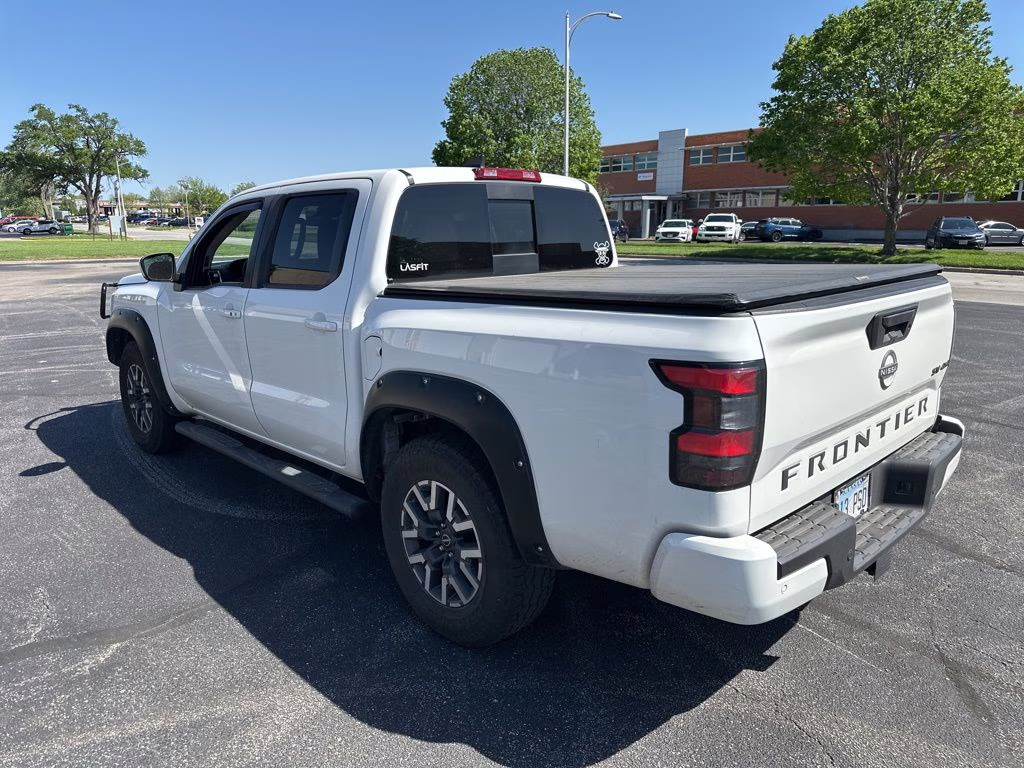 2023 Glacier White Nissan Frontier SV 4X4 Truck
