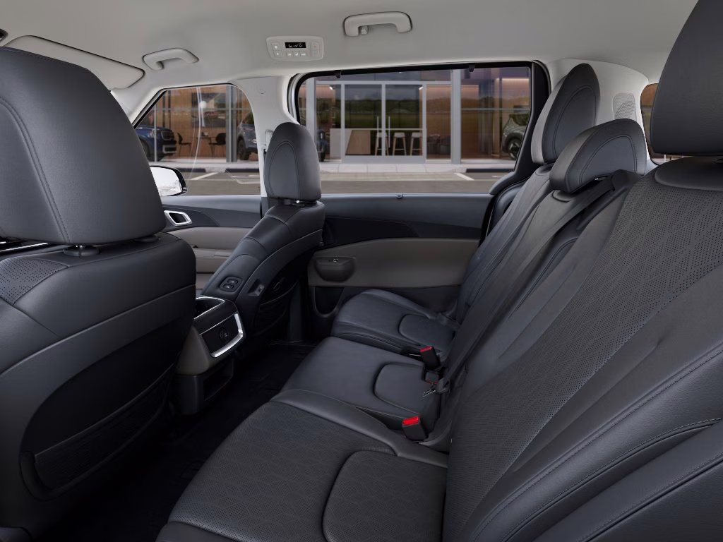 2026 Snow White Pearl Kia Carnival EX FWD Van