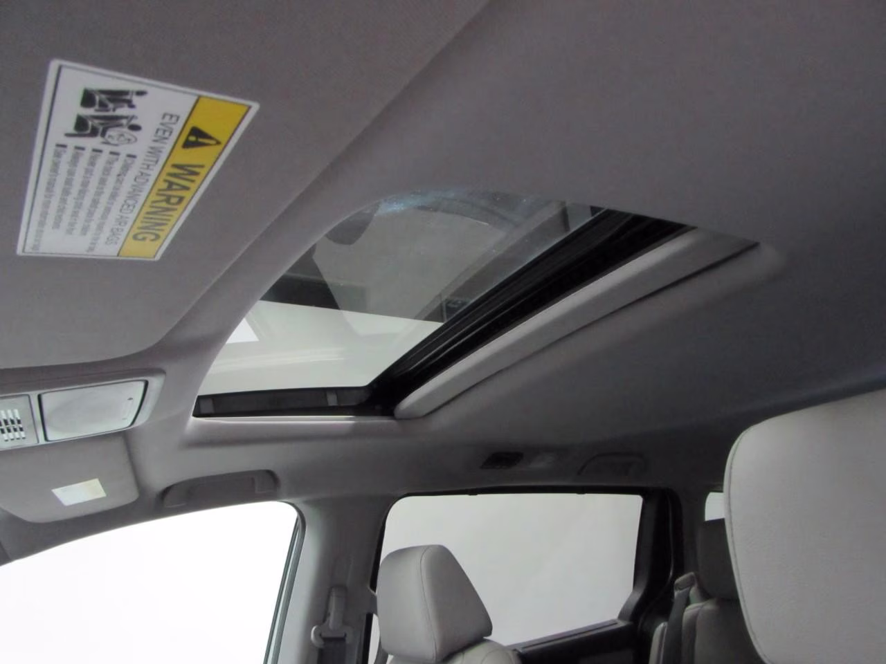2024 Lunar Silver Metallic Honda Odyssey EX-L FWD Van