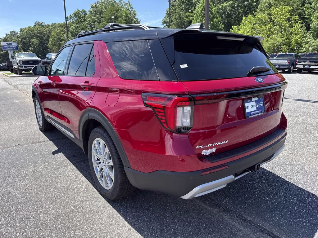 2026 Rapid Red Metallic Tinted Clearcoat Ford Explorer Platinum RWD SUV