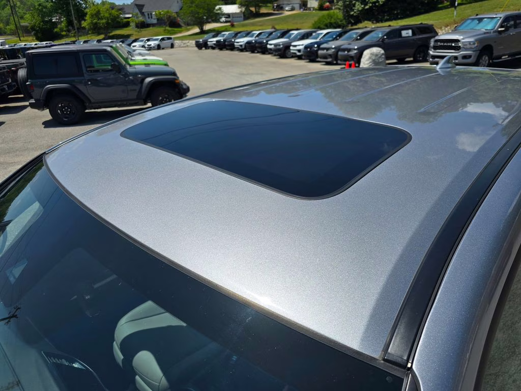 2023 Lunar Silver Metallic Honda Passport EX-L AWD SUV