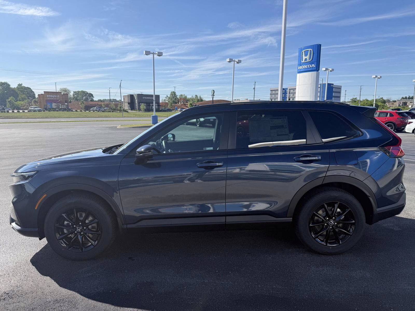 2026 Canyon River Blue Metallic Honda CR-V Hybrid Sport-L AWD SUV