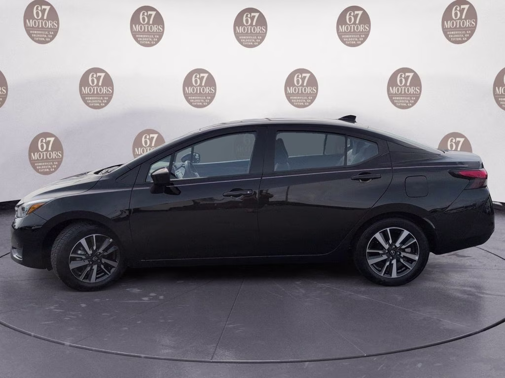 2025 Super Black Metallic Nissan Versa 1.6 SV FWD Sedan