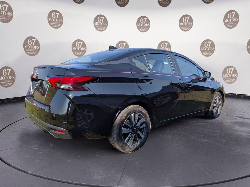 2025 Super Black Metallic Nissan Versa 1.6 SV FWD Sedan