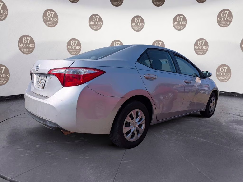 2014 Classic Silver Metallic Toyota Corolla L FWD Sedan