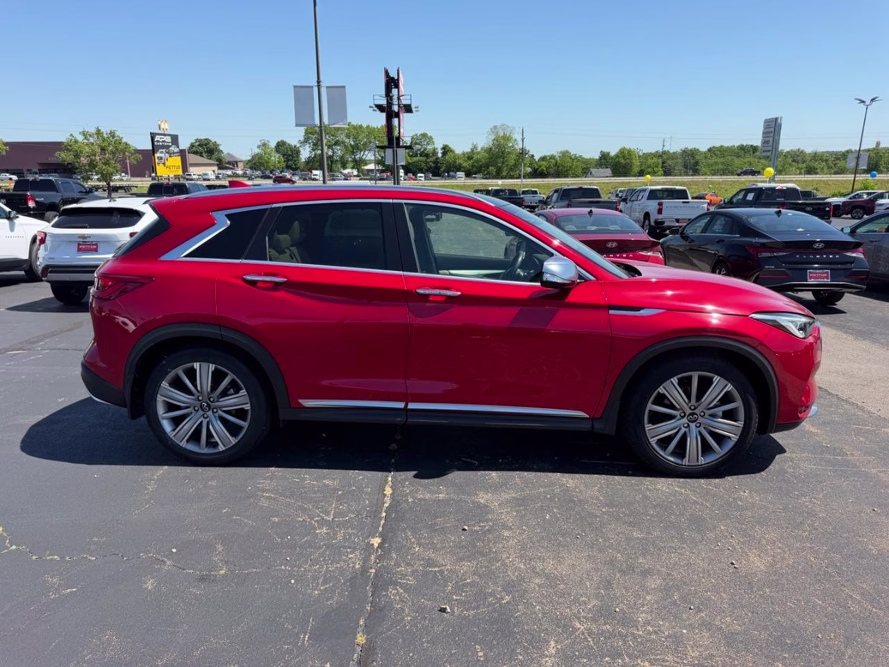 2021 Dynamic Sunstone Red INFINITI QX50 SENSORY AWD SUV