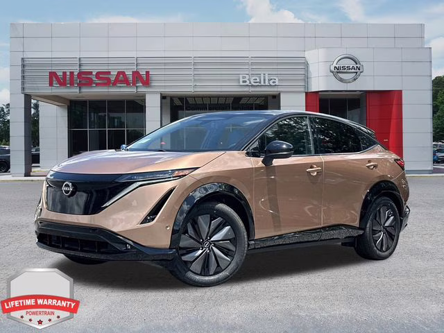 2025 Sunrise Copper Pearl/Black Diamond Pearl Nissan ARIYA PLATINUM+ e-4ORCE AWD SUV