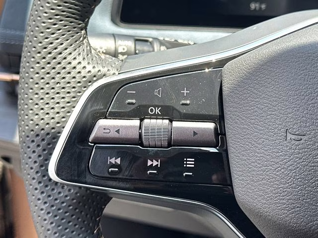 2025 Sunrise Copper Pearl/Black Diamond Pearl Nissan ARIYA PLATINUM+ e-4ORCE AWD SUV