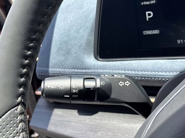 2025 Sunrise Copper Pearl/Black Diamond Pearl Nissan ARIYA PLATINUM+ e-4ORCE AWD SUV