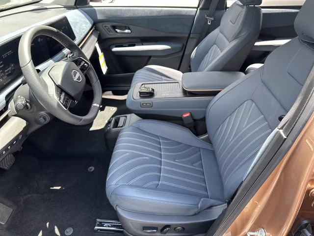 2025 Sunrise Copper Pearl/Black Diamond Pearl Nissan ARIYA PLATINUM+ e-4ORCE AWD SUV