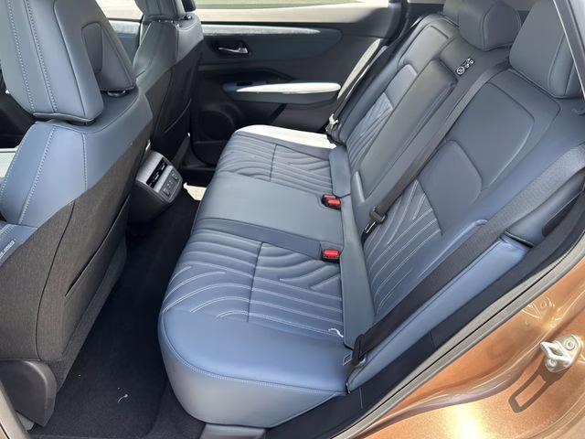 2025 Sunrise Copper Pearl/Black Diamond Pearl Nissan ARIYA PLATINUM+ e-4ORCE AWD SUV