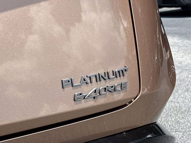 2025 Sunrise Copper Pearl/Black Diamond Pearl Nissan ARIYA PLATINUM+ e-4ORCE AWD SUV