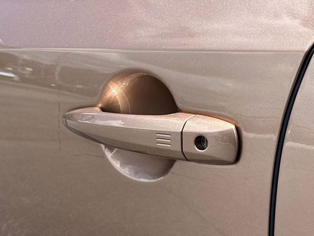 2025 Sunrise Copper Pearl/Black Diamond Pearl Nissan ARIYA PLATINUM+ e-4ORCE AWD SUV