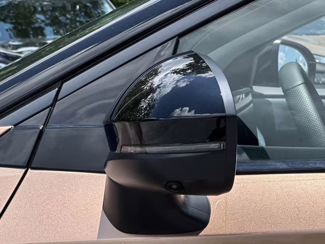 2025 Sunrise Copper Pearl/Black Diamond Pearl Nissan ARIYA PLATINUM+ e-4ORCE AWD SUV