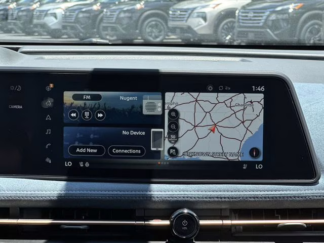 2025 Sunrise Copper Pearl/Black Diamond Pearl Nissan ARIYA PLATINUM+ e-4ORCE AWD SUV