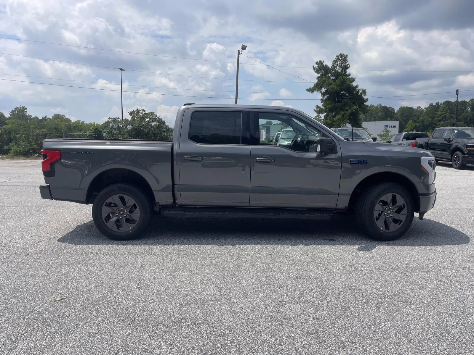 2025 Gray Metallic Ford F-150 Lightning Flash AWD Truck