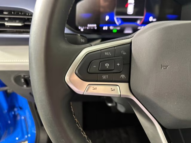 2024 Cornflower Blue Volkswagen Taos 1.5T SE AWD SUV