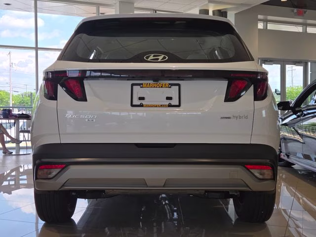2026 Creamy White Pearl Hyundai Tucson Hybrid Blue SE AWD SUV