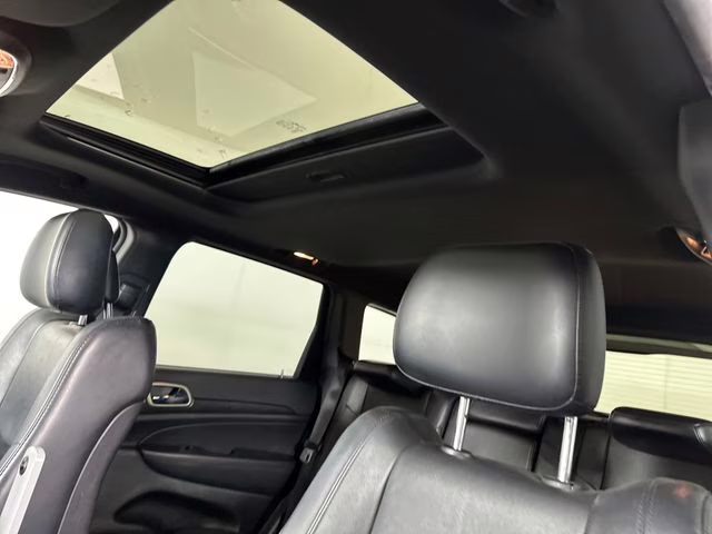 2015 Billet Silver Metallic Clearcoat Jeep Grand Cherokee Altitude 4X4 SUV