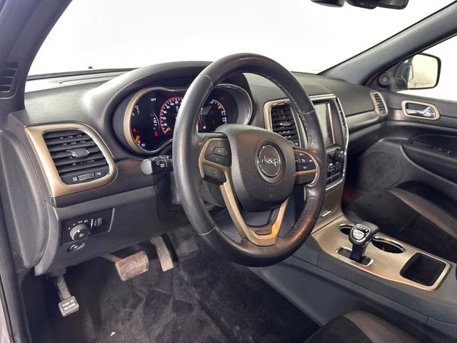 2015 Billet Silver Metallic Clearcoat Jeep Grand Cherokee Altitude 4X4 SUV