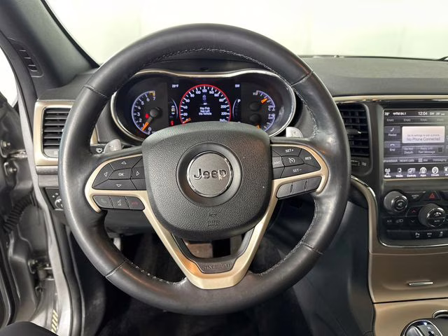 2015 Billet Silver Metallic Clearcoat Jeep Grand Cherokee Altitude 4X4 SUV