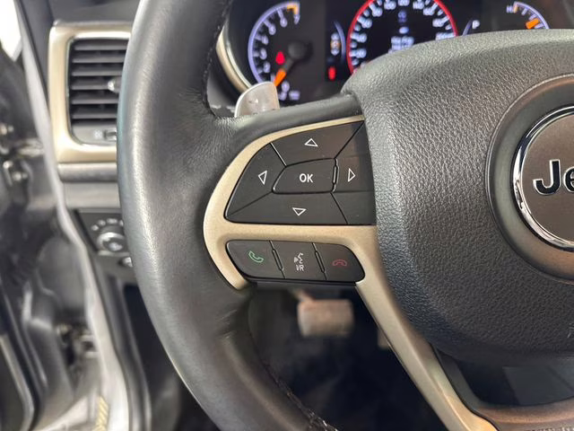 2015 Billet Silver Metallic Clearcoat Jeep Grand Cherokee Altitude 4X4 SUV