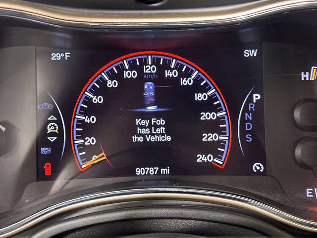 2015 Billet Silver Metallic Clearcoat Jeep Grand Cherokee Altitude 4X4 SUV