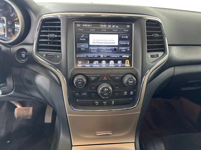 2015 Billet Silver Metallic Clearcoat Jeep Grand Cherokee Altitude 4X4 SUV