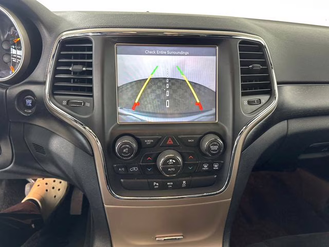 2015 Billet Silver Metallic Clearcoat Jeep Grand Cherokee Altitude 4X4 SUV