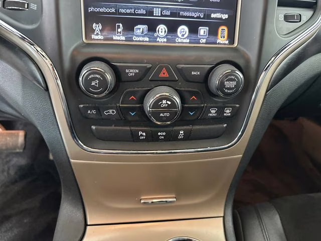 2015 Billet Silver Metallic Clearcoat Jeep Grand Cherokee Altitude 4X4 SUV