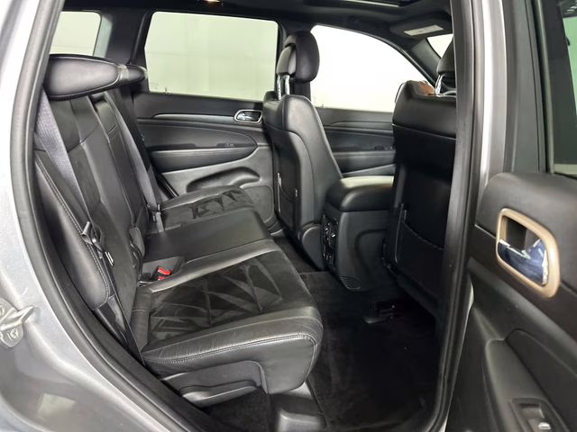 2015 Billet Silver Metallic Clearcoat Jeep Grand Cherokee Altitude 4X4 SUV