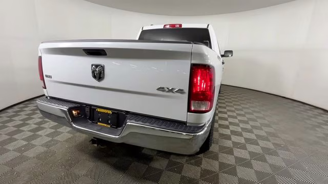 2023 Bright White Clearcoat Ram 1500 Classic SLT 4X4 Truck
