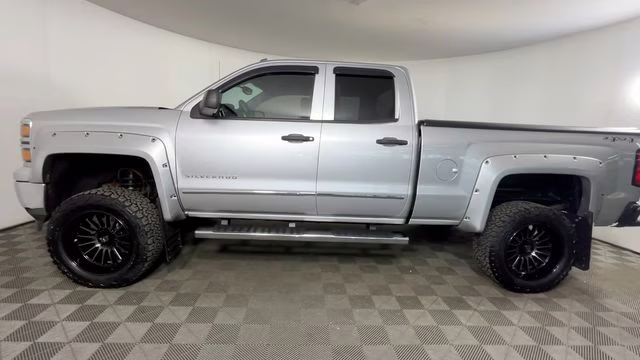 2014 Silver Ice Metallic Chevrolet Silverado 1500 LT 4X4 Truck